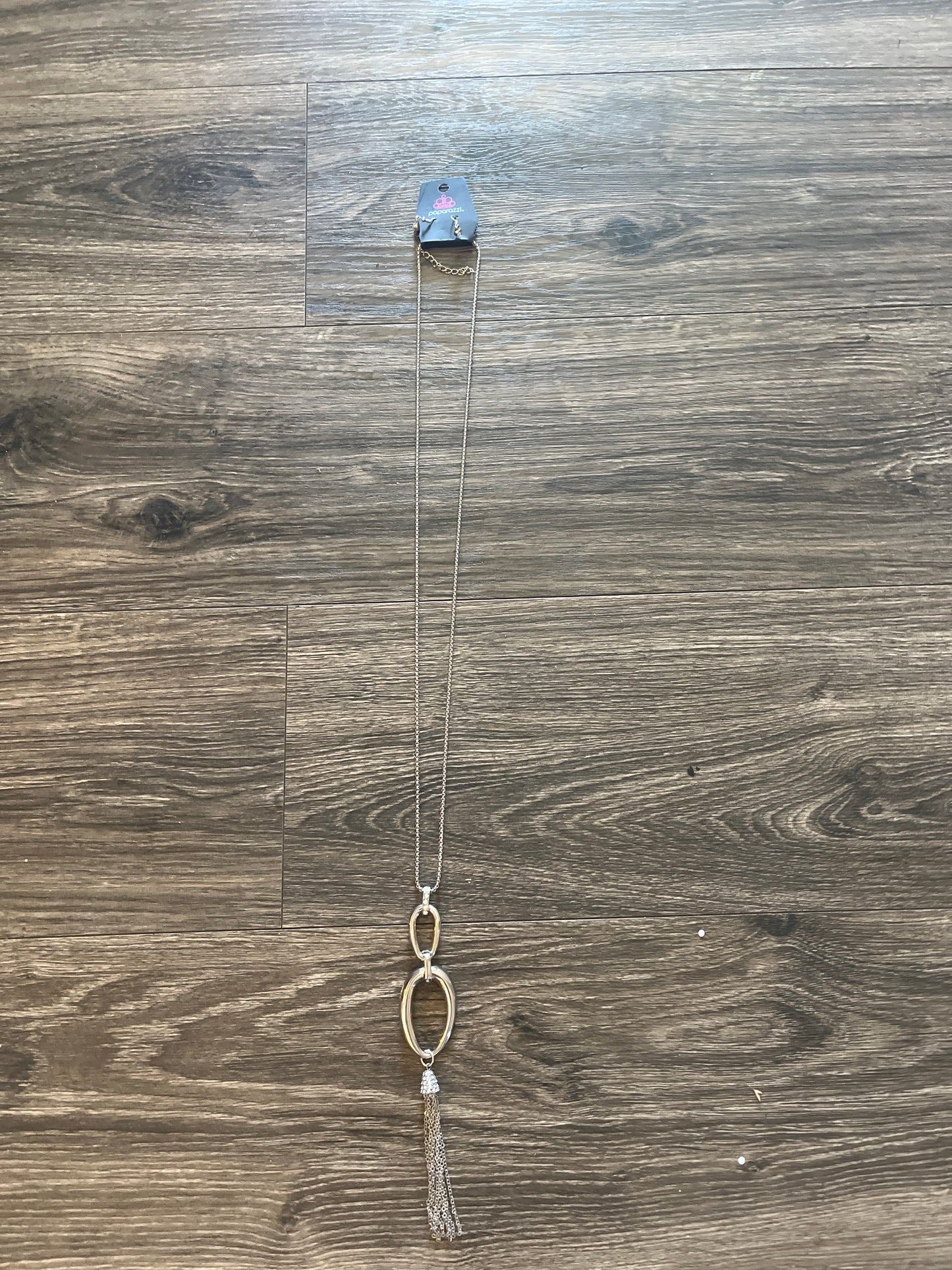 Brand new long silver necklace with matching earring $4